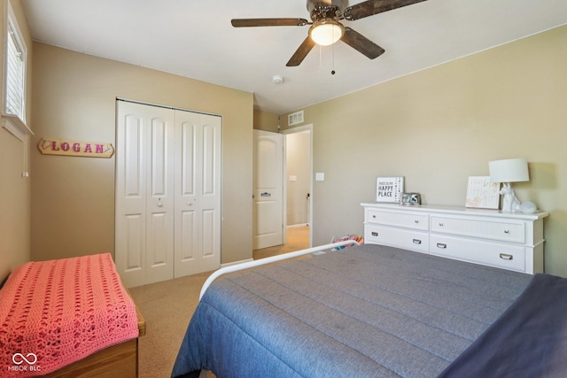 16745 Del Mar Way, Westfield, IN 46074 - bedroom with light carpet, a closet, and a ceiling fan