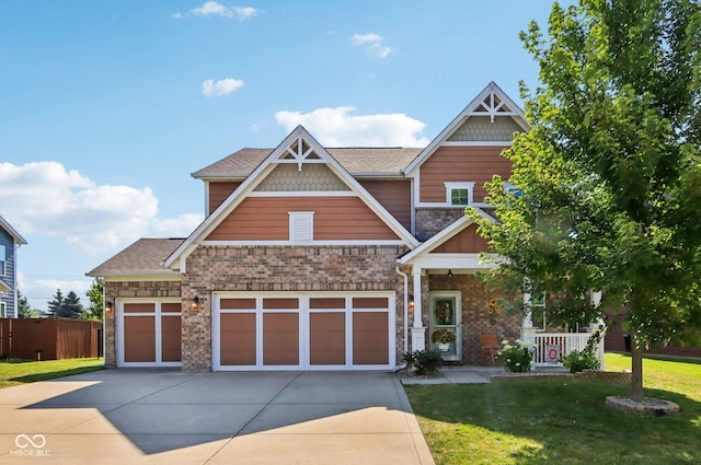 16745 Del Mar Way, Westfield, IN 46074 - craftsman-style home featuring driveway, a garage, stone siding, brick siding, and a porch