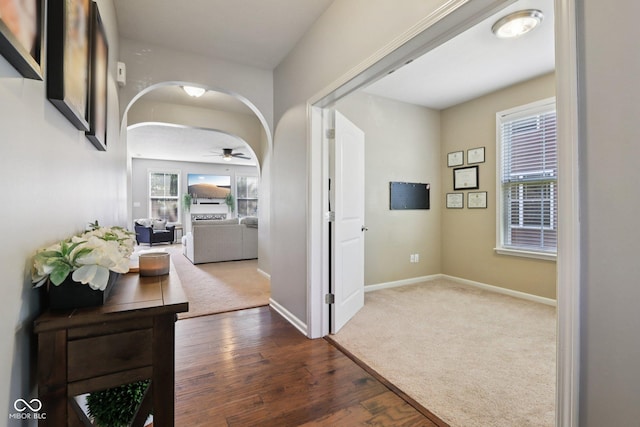 16745 Del Mar Way, Westfield, IN 46074 - corridor with carpet, arched walkways, and wood finished floors