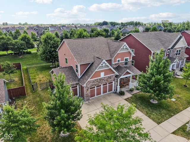 16745 Del Mar Way, Westfield, IN 46074 - view of front of house with a residential view, stone siding, concrete driveway, roof with shingles, and a garage