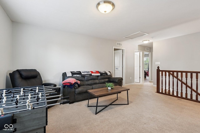 16745 Del Mar Way, Westfield, IN 46074 - carpeted living room featuring attic access