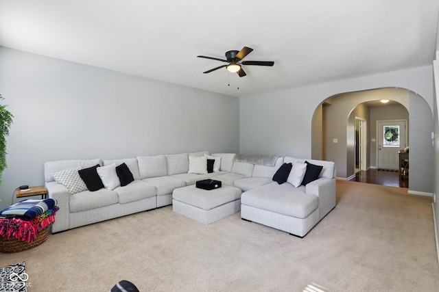 16745 Del Mar Way, Westfield, IN 46074 - living area featuring carpet, arched walkways, and ceiling fan