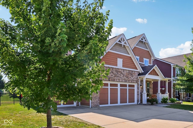 16745 Del Mar Way, Westfield, IN 46074 - craftsman-style house featuring stone siding, driveway, and a garage