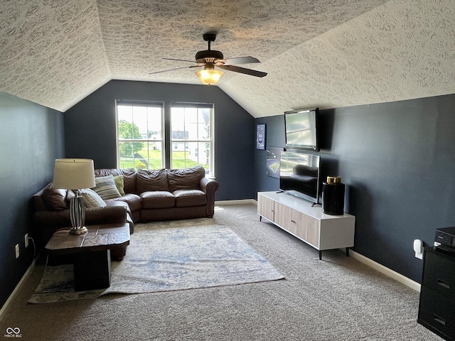 8202 Stonelick Dr, Avon, IN 46123 - carpeted living room featuring a ceiling fan, lofted ceiling, and a textured ceiling