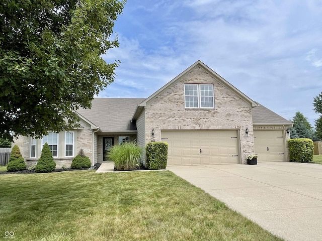 8202 Stonelick Dr, Avon, IN 46123 - traditional home featuring brick siding, driveway, a front yard, a shingled roof, and a garage