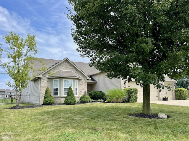 8202 Stonelick Dr, Avon, IN 46123 - view of front of house with brick siding, concrete driveway, and an attached garage