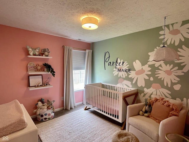 8202 Stonelick Dr, Avon, IN 46123 - carpeted bedroom featuring a crib and a textured ceiling