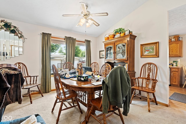 1044 Miller St, Clinton, IN 47842 - dining room with a ceiling fan, light carpet, a textured ceiling, and vaulted ceiling