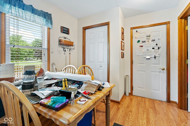 1044 Miller St, Clinton, IN 47842 - dining area featuring light wood finished floors and baseboards