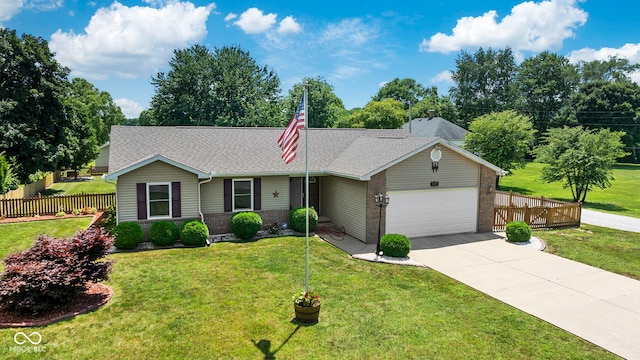 1044 Miller St, Clinton, IN 47842 - ranch-style house with a garage, driveway, brick siding, and a shingled roof