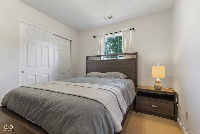 7009 Thousand Oaks Ln, Indianapolis, IN 46214 - carpeted bedroom featuring a closet and baseboards