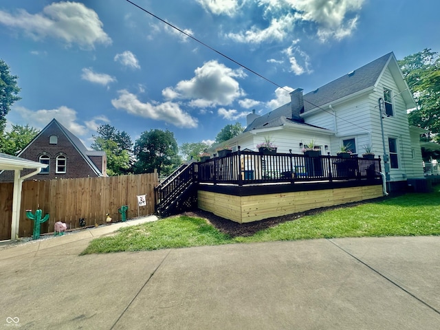 513 N Main St, Veedersburg, IN 47987 - back of house featuring a wooden deck and stairway
