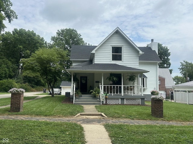 513 N Main St, Veedersburg, IN 47987 - view of front of home featuring a porch, a chimney, and roof with shingles