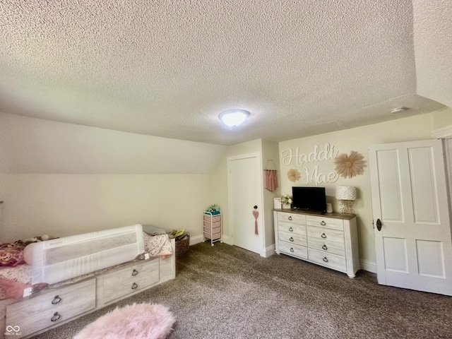 513 N Main St, Veedersburg, IN 47987 - bedroom featuring dark colored carpet, a textured ceiling, and vaulted ceiling