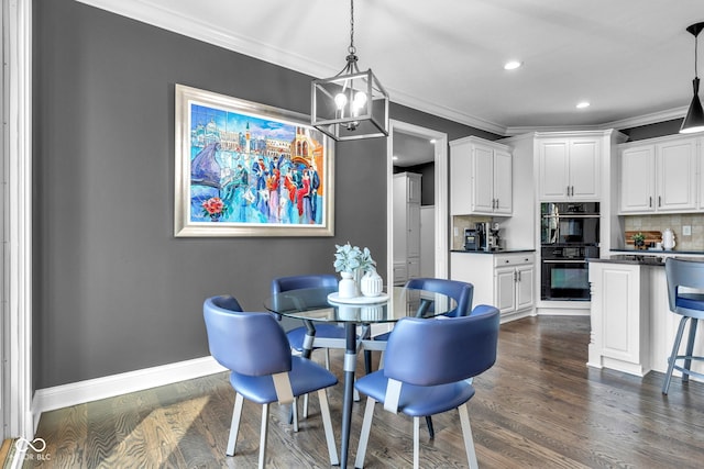 11354 Redwing Ct, Fishers, IN 46037 - dining room featuring ornamental molding, a chandelier, recessed lighting, and dark wood finished floors