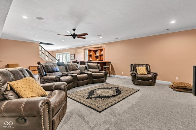 11354 Redwing Ct, Fishers, IN 46037 - carpeted living area with stairway, recessed lighting, ornamental molding, and ceiling fan