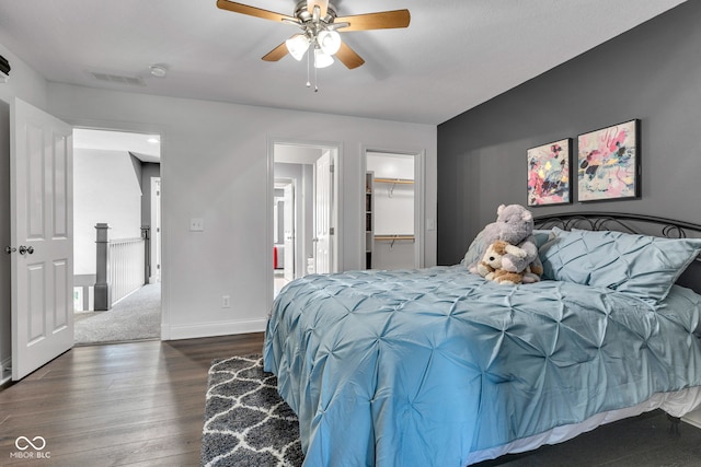 11354 Redwing Ct, Fishers, IN 46037 - bedroom with wood finished floors, ensuite bath, a walk in closet, and a ceiling fan