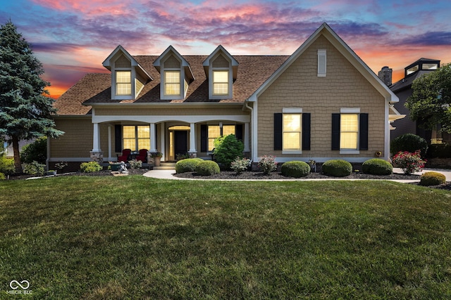 11354 Redwing Ct, Fishers, IN 46037 - view of front of property with a porch, a front yard, and roof with shingles
