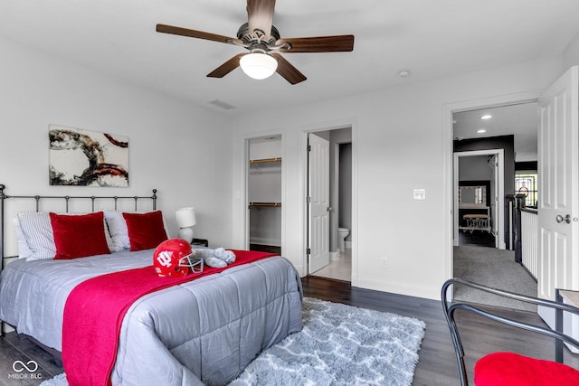 11354 Redwing Ct, Fishers, IN 46037 - bedroom featuring wood finished floors, a walk in closet, ensuite bath, recessed lighting, and ceiling fan