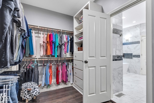 11354 Redwing Ct, Fishers, IN 46037 - walk in closet featuring wood finished floors