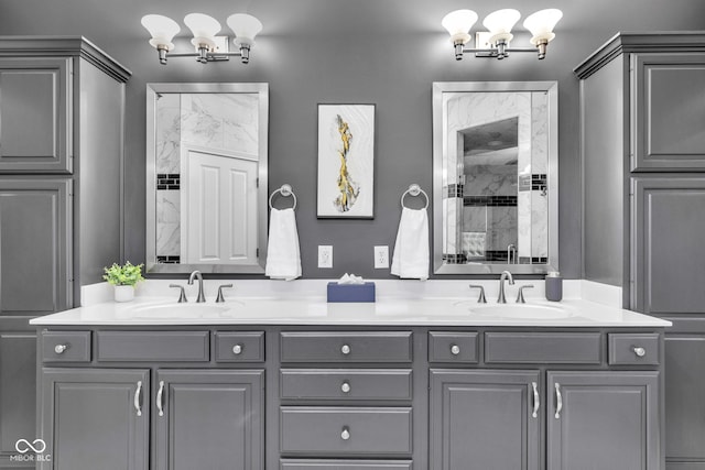 11354 Redwing Ct, Fishers, IN 46037 - bathroom with a chandelier, a tile shower, and double vanity