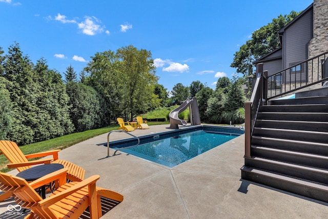 11354 Redwing Ct, Fishers, IN 46037 - outdoor pool with a water slide, stairway, and a patio