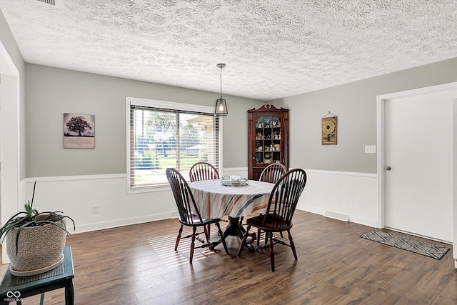 3280 E 300 S, Greenfield, IN 46140 - dining room featuring a wainscoted wall, dark wood-style floors, and a textured ceiling