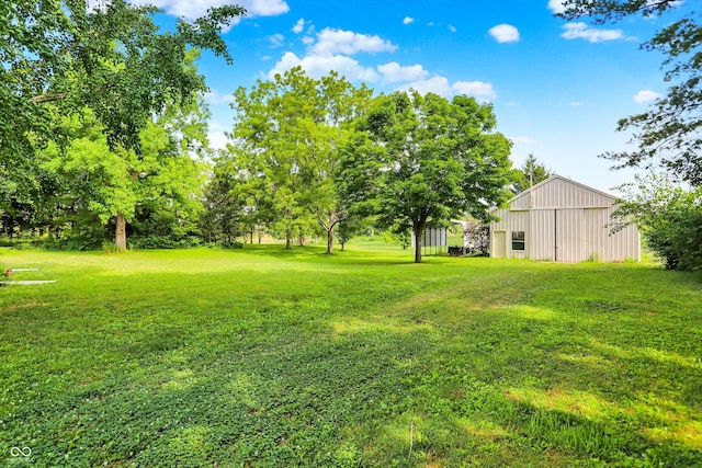 3280 E 300 S, Greenfield, IN 46140 - view of grassy yard with an outbuilding and a garage