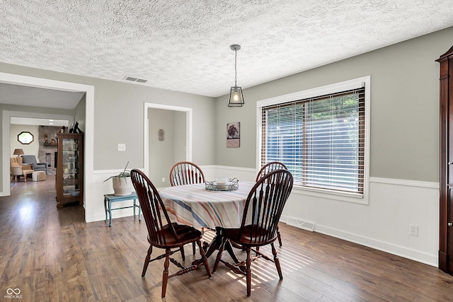 3280 E 300 S, Greenfield, IN 46140 - dining room with dark wood finished floors, a wainscoted wall, and a textured ceiling
