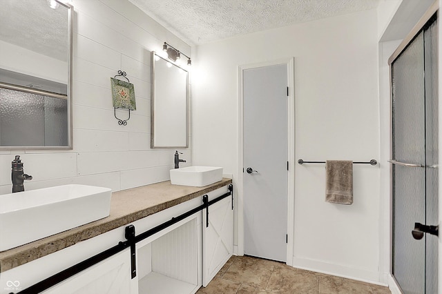 3280 E 300 S, Greenfield, IN 46140 - full bathroom featuring double vanity, a textured ceiling, and an enclosed shower