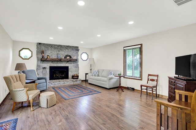 3280 E 300 S, Greenfield, IN 46140 - living room with wood finished floors, a stone fireplace, and recessed lighting