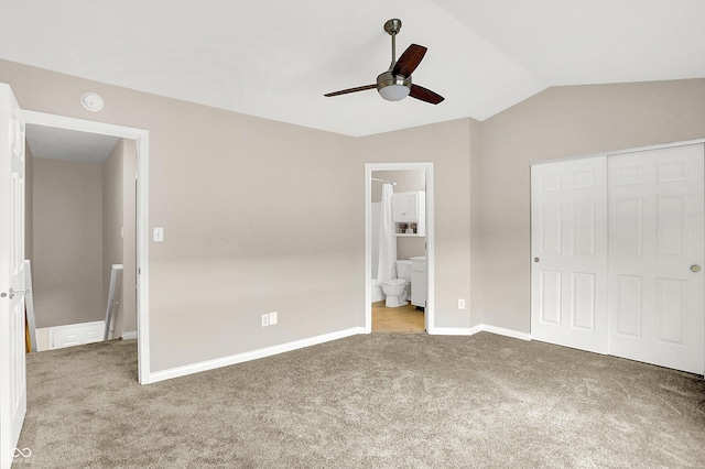 3084 Armory Dr, Indianapolis, IN 46208 - unfurnished bedroom featuring carpet, a closet, lofted ceiling, ensuite bathroom, and ceiling fan