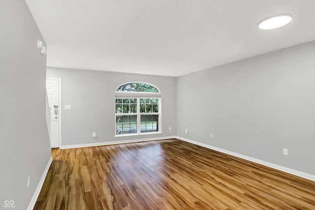 3084 Armory Dr, Indianapolis, IN 46208 - empty room with wood finished floors and baseboards