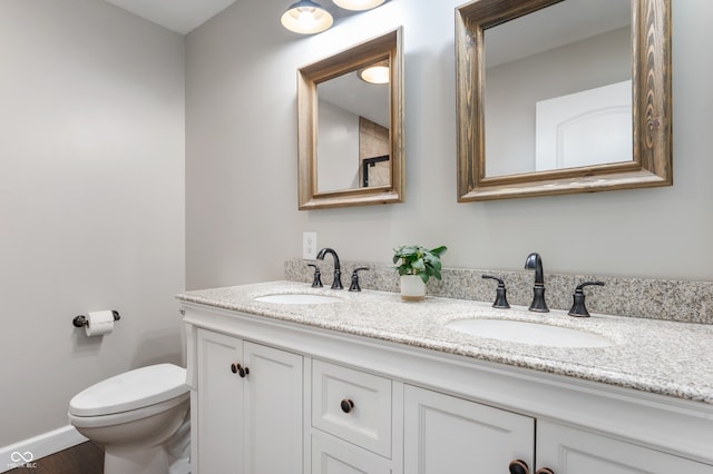 7045 W 100 N, Greenfield, IN 46140 - bathroom with double vanity and wood finished floors