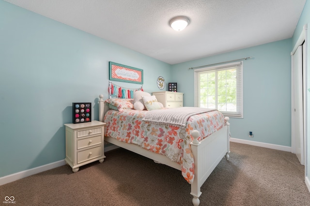 7045 W 100 N, Greenfield, IN 46140 - bedroom featuring dark colored carpet and a textured ceiling
