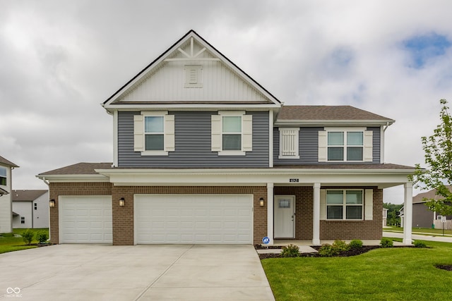 6143 Madera Dr, Whitestown, IN 46075 - view of front of house featuring brick siding, a front lawn, concrete driveway, and an attached garage