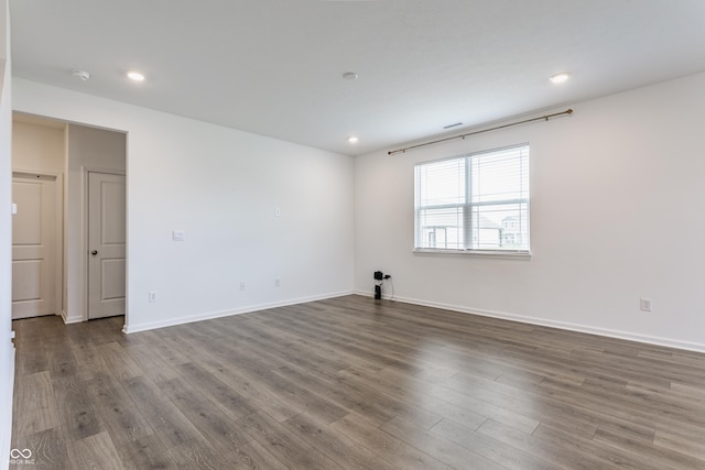 6143 Madera Dr, Whitestown, IN 46075 - spare room with wood finished floors, recessed lighting, and a smoke detector