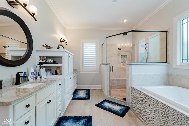4545 Pascagoula Run, Greenwood, IN 46143 - bathroom with healthy amount of natural light, a bath, vanity, a shower stall, and crown molding