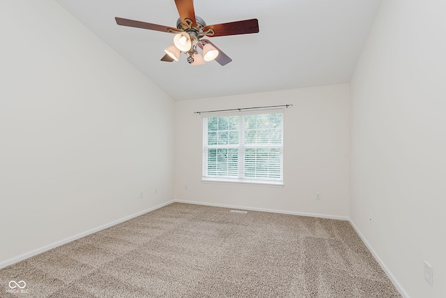 12291 Cobblestone Dr, Fishers, IN 46037 - carpeted spare room with vaulted ceiling and ceiling fan
