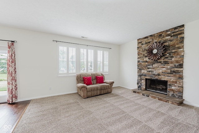 12291 Cobblestone Dr, Fishers, IN 46037 - sitting room with a fireplace and baseboards