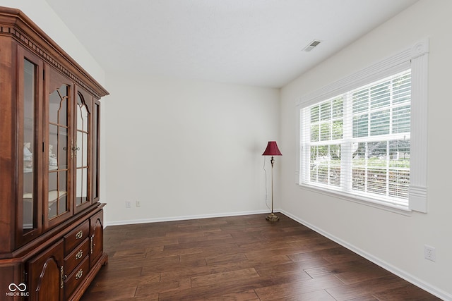 12291 Cobblestone Dr, Fishers, IN 46037 - spare room with dark wood-type flooring