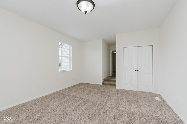 12291 Cobblestone Dr, Fishers, IN 46037 - unfurnished bedroom with carpet and a closet