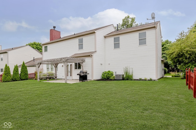 12291 Cobblestone Dr, Fishers, IN 46037 - back of house featuring a pergola, a patio area, a yard, and a chimney