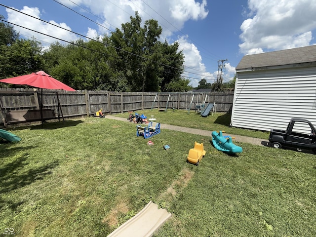 3209 Forest Ter, Anderson, IN 46013 - fenced backyard with a playground