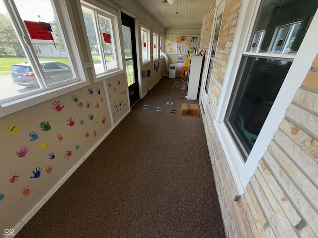 3209 Forest Ter, Anderson, IN 46013 - unfurnished sunroom featuring carpet