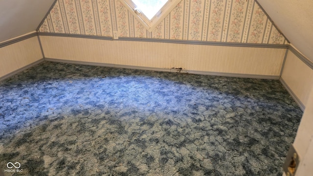 1338 Glenn Ave, Wabash, IN 46992 - bonus room with wainscoting, dark colored carpet, and wallpapered walls