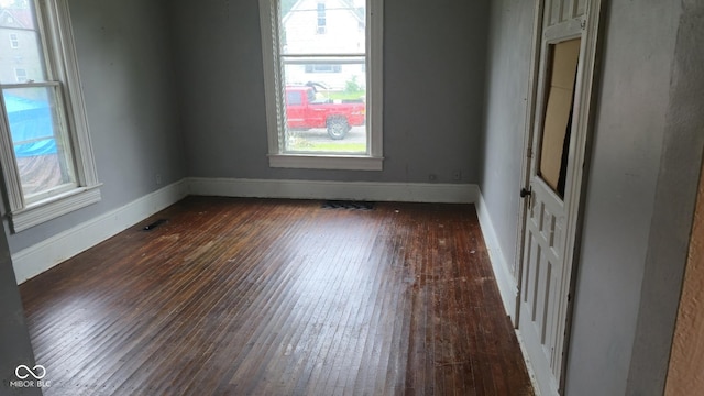1338 Glenn Ave, Wabash, IN 46992 - spare room featuring dark wood-style flooring