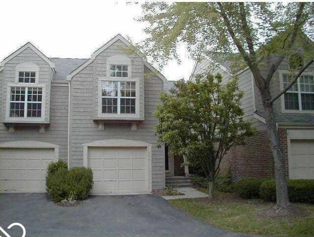 6458 Watham Ct, Indianapolis, IN 46250 - view of front of property featuring a garage and driveway
