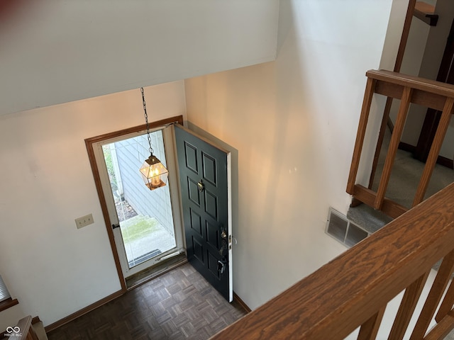 6458 Watham Ct, Indianapolis, IN 46250 - foyer with baseboards and stairway