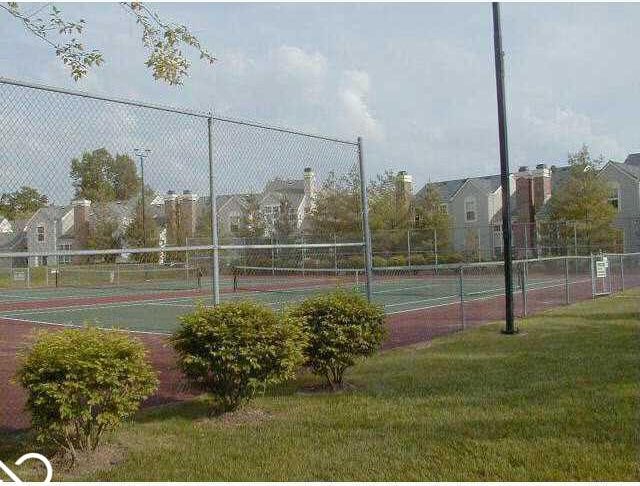 6458 Watham Ct, Indianapolis, IN 46250 - view of tennis court with a residential view